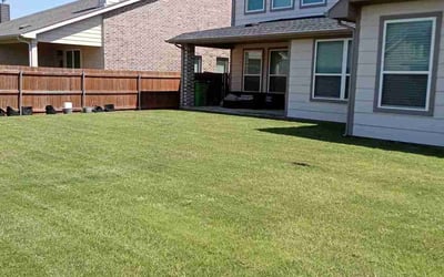 Photo of Shahana A.'s yard after getting lawn care in Clermont, FL