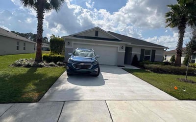 Photo of Travis E.'s yard after getting lawn care in Cocoa, FL