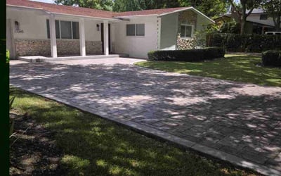 Photo of Kimbalee F.'s yard after getting lawn care in Hialeah, FL