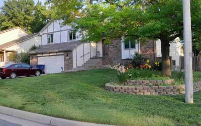 Photo of Gina M.'s yard after getting lawn care in Haysville, KS