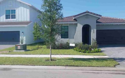 Photo of Raviram G.'s yard after getting lawn care in Loxahatchee, FL