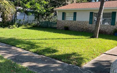 Photo of Jennifer G.'s yard after getting lawn care in Ormond Beach, FL