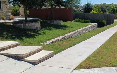 Photo of Linda H.'s yard after getting lawn care in Buda, TX
