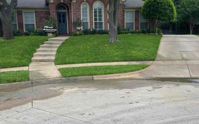 Photo of Lisa M.'s yard after getting lawn care in Keller, TX