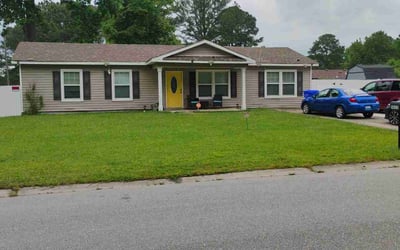 Photo of Maya Z.'s yard after getting lawn care in Suffolk, VA