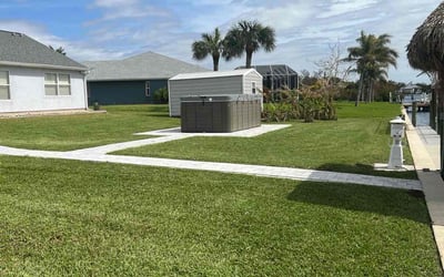 Photo of Charles M.'s yard after getting lawn care in Port Charlotte, FL
