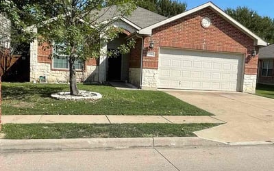 Photo of Gina T.'s yard after getting lawn care in Springtown, TX