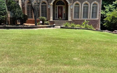 Photo of Jenifer M.'s yard after getting lawn care in Mableton, GA
