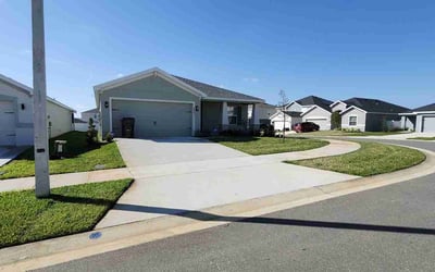 Photo of Karen M.'s yard after getting lawn care in Davenport, FL