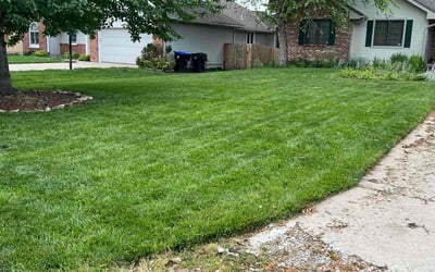 Photo of Journey B.'s yard after getting lawn care in Topeka, KS
