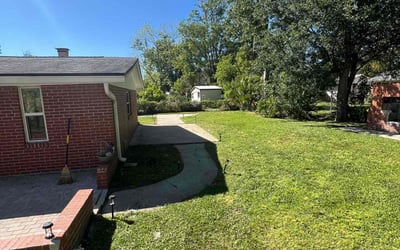 Photo of Zaria E.'s yard after getting lawn care in Jacksonville, FL