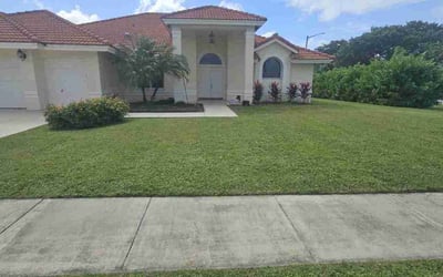 Photo of Ted T.'s yard after getting lawn care in Boca Raton, FL