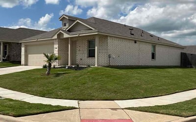 Photo of Valerie S.'s yard after getting lawn care in Azle, TX