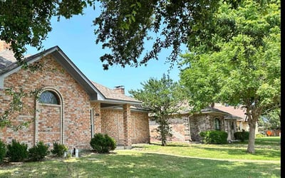 Photo of Paulette A.'s yard after getting lawn care in Rowlett, TX