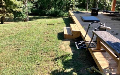 Photo of Tamala C.'s yard after getting lawn care in Henderson, TX