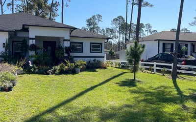 Photo of Tamia B.'s yard after getting lawn care in Holly Hill, FL