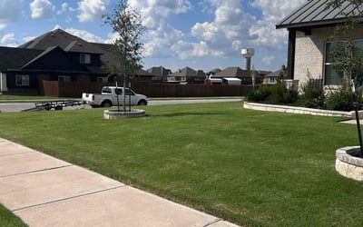 Photo of Maureen M.'s yard after getting lawn care in Decatur, TX