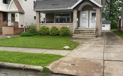 Photo of Kendall M.'s yard after getting lawn care in Lakewood, OH