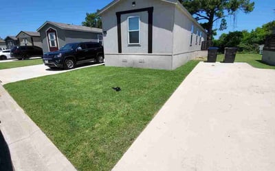 Photo of Becky J.'s yard after getting lawn care in Greenville, TX