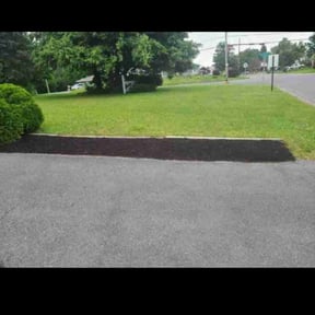 Mulching by Mow Green Lawns reviewed on May 13, 2022
