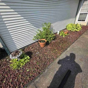 Flower Bed Weeding by Bigfoot Landscape Group . Com reviewed on August 21, 2025