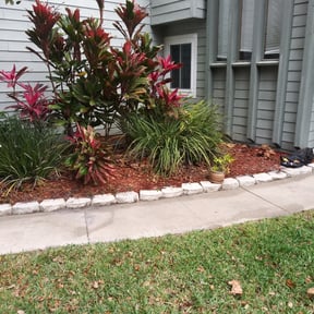 Flower Bed Weeding by Smack Down lawns and tractor services reviewed on August 21, 2025